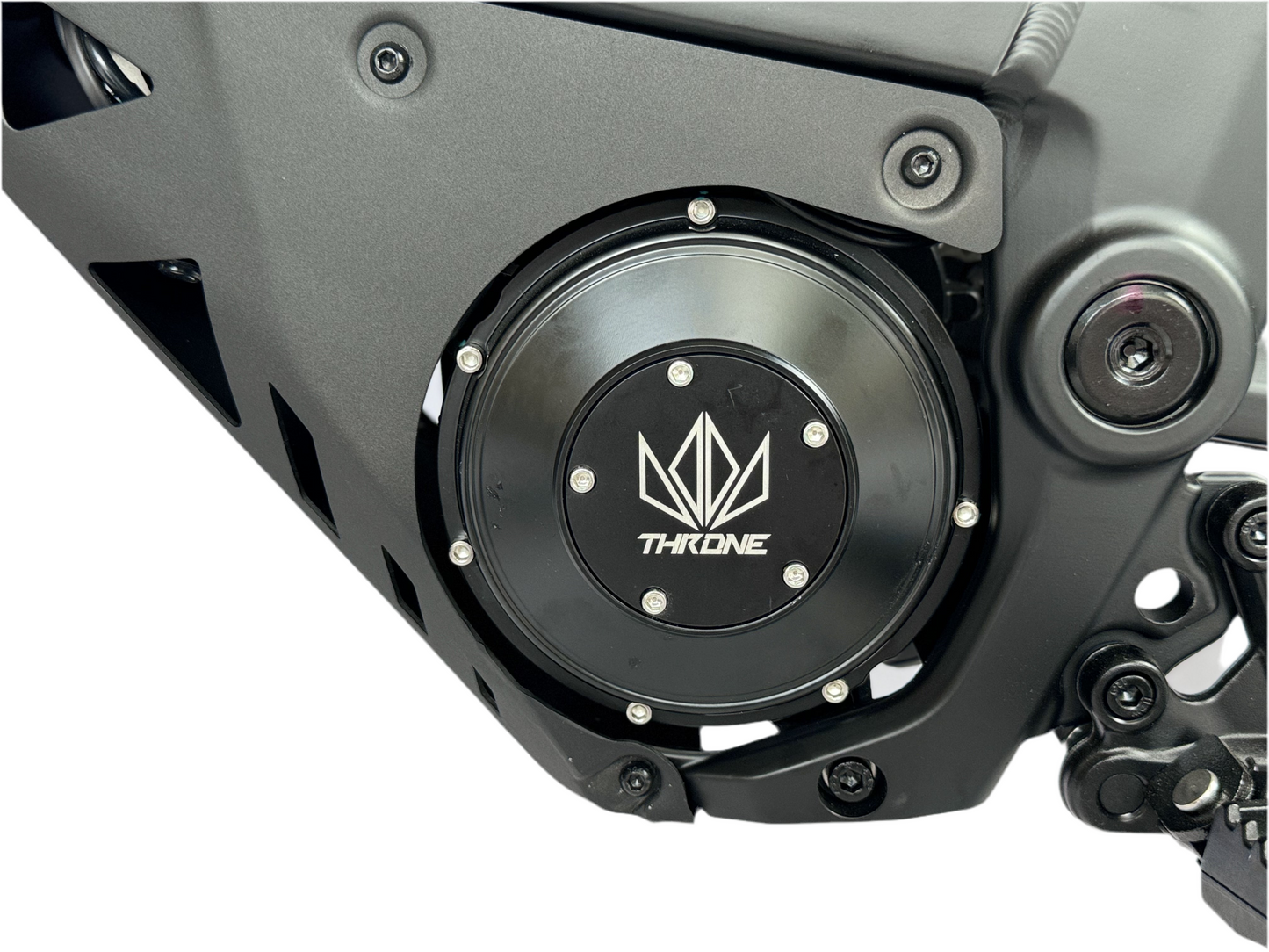 Close-up of a mechanical component with 'Throne' logo on a white background