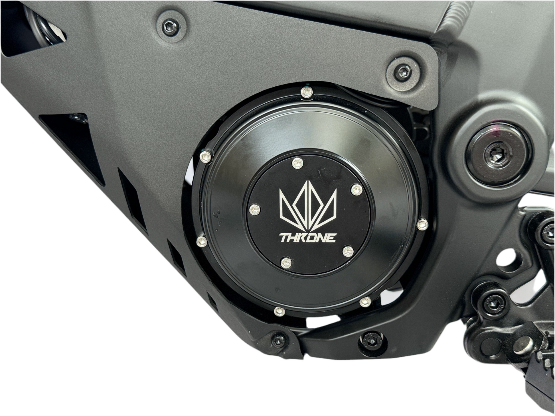 Close-up of a mechanical component with 'Throne' logo on a white background